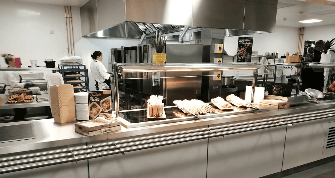 Modern commercial kitchen setup in a school showing school kitchen design with efficient layout and professional catering equipment.