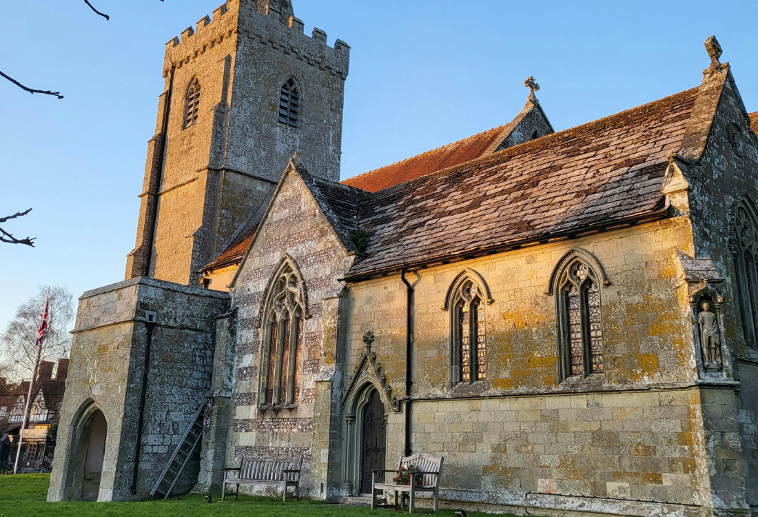 Historic stone church building with tower and arched windows, representing a venue requiring commercial kitchen equipment for Easter.