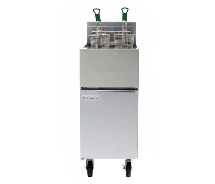 A Frymaster fryer being used in a school kitchen to prepare  the fries that are on today's lunch menu.