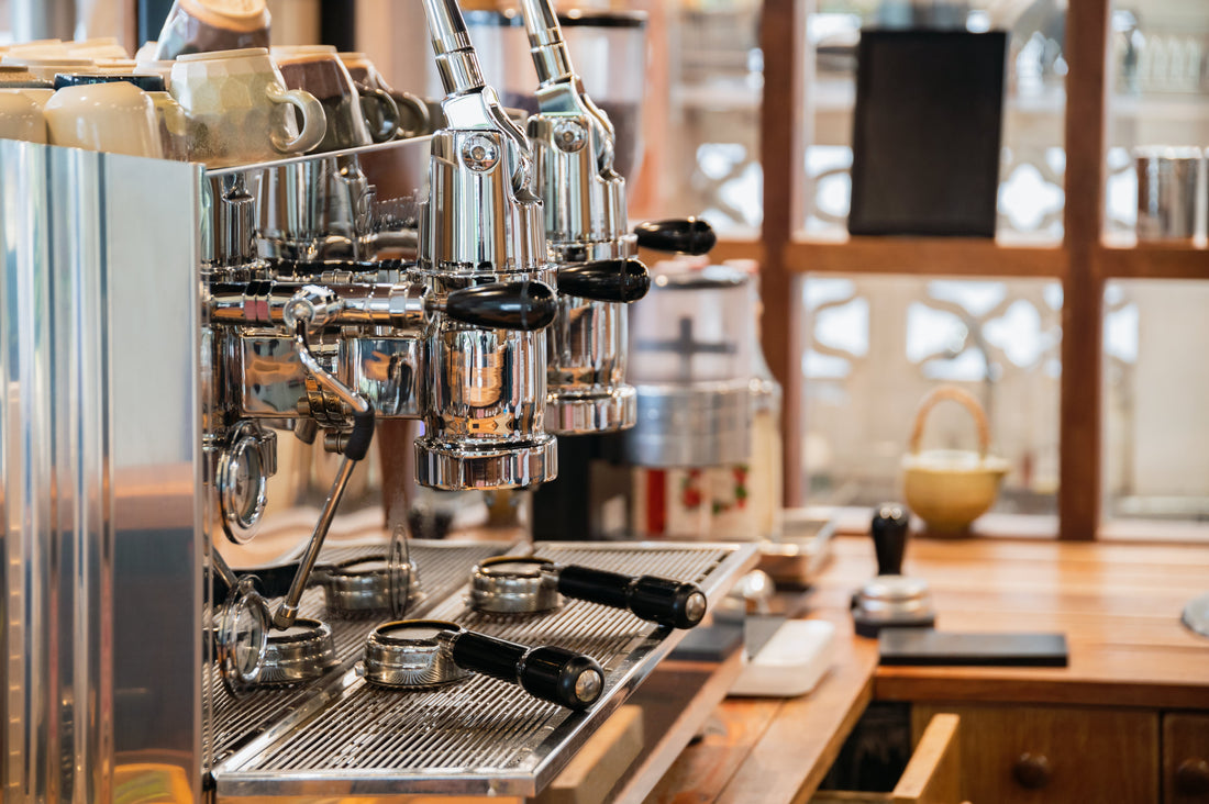 Compact café kitchen setup with appliances, showcasing commercial kitchen equipment designed for small spaces.
