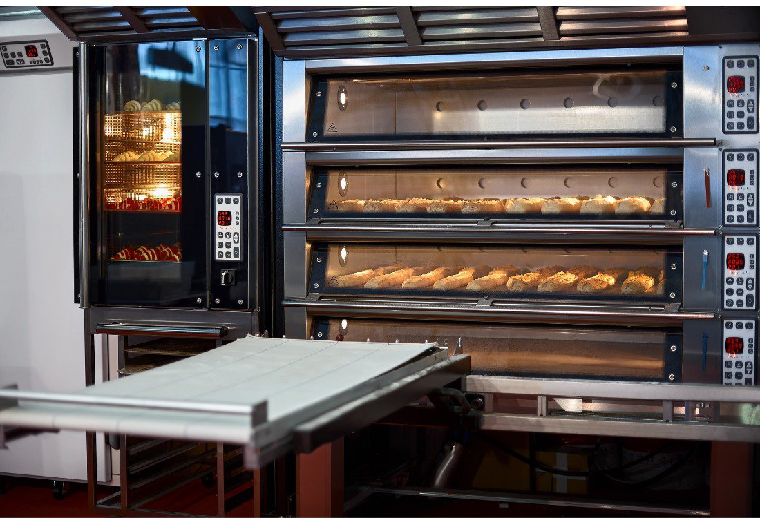 A convection oven being used instead of a combi oven to cook bread.