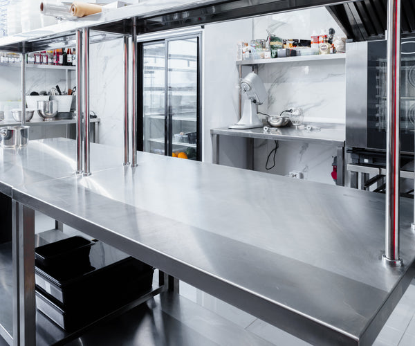 Why Off-The-Shelf Prep Benches Can't Match Bespoke Steel Table Fabrication