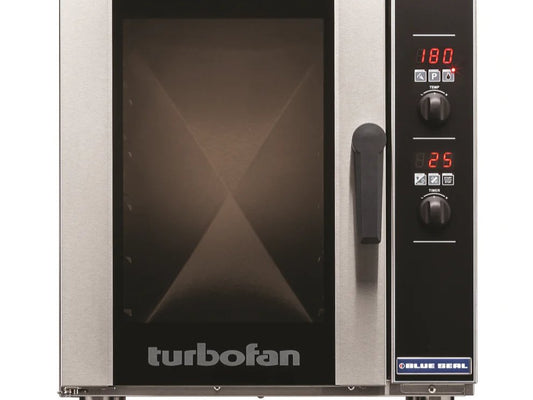 A Blue Seal convection oven is used in a school to cook the food.