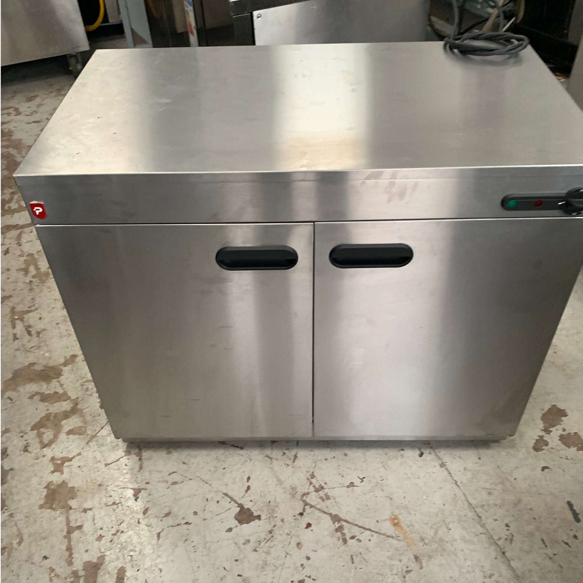 Second hand but unused Parry Static Hot Cupboard (9214) top view with closed doors