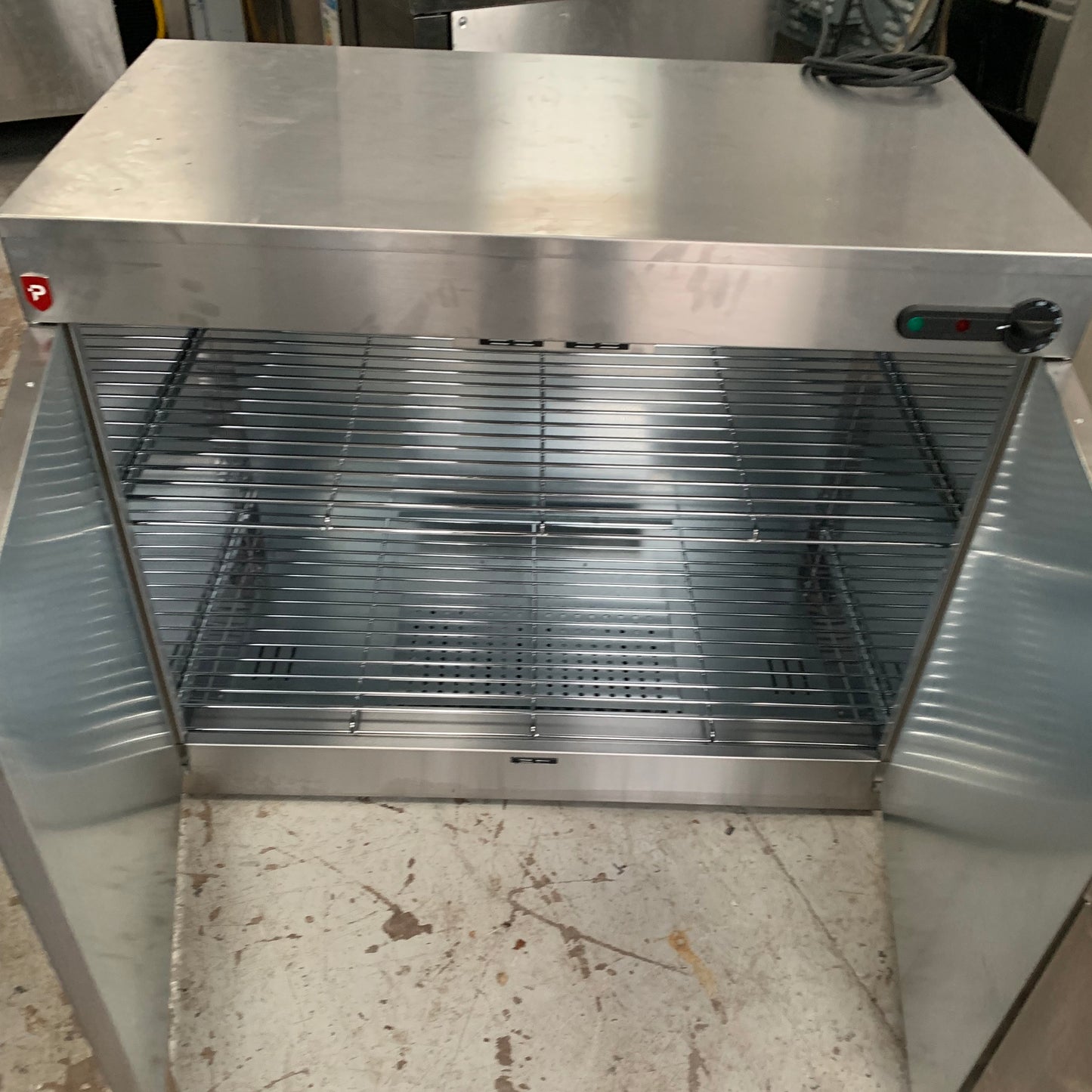 Second hand but unused Parry Static Hot Cupboard (9214) inside view with open doors