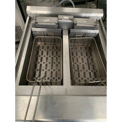 Second hand Falcon Twin Tank Electric Fryer (E3862) inside tank view with baskets